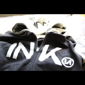 UNISEX VARSITY ZIP-UP HOODIE